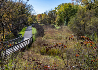 Canal Trail with bridge over a brook.
